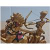 Image 3 : Egyptian-style chariot statue depicting a pharaoh, often identified as King Ramses II, aiming a bow.
