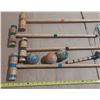 Image 2 : Vintage wooden croquet set, likely from the mid-20th century, containing mallets, balls, etc.