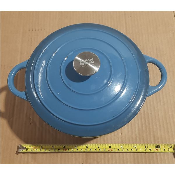 Blue Kuhn Rikon enameled cast iron Dutch oven.
