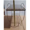 Image 5 : Vintage Mid-Century Modern table features a gold-toned brass tubular design with a smoked glass top 