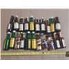 Image 1 : Collection features various miniature alcohol bottles, including brands like Cutty Sark, Seagram's V