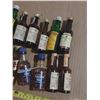 Image 5 : Collection features various miniature alcohol bottles, including brands like Cutty Sark, Seagram's V