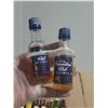 Image 7 : Collection features various miniature alcohol bottles, including brands like Cutty Sark, Seagram's V