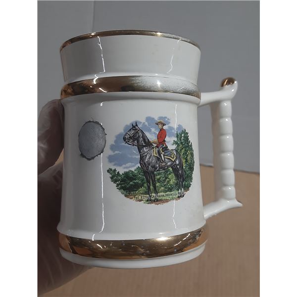 Vintage ceramic tankard is a Prince William Ware beer stein featuring 22-carat gold trim. (Made in E