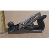 Image 1 : Vintage hand plane, commonly used for smoothing wood surfaces.