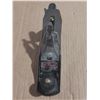 Image 4 : Vintage hand plane, commonly used for smoothing wood surfaces.