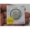 Image 1 : 1947 Maple Leaf Silver 50 Cents with Straight 7 to the Left. VF30.