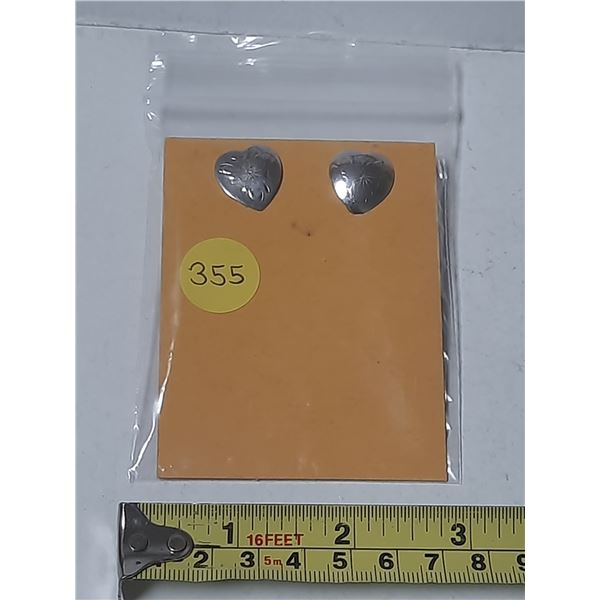 Heart-shaped Silver Earrings.