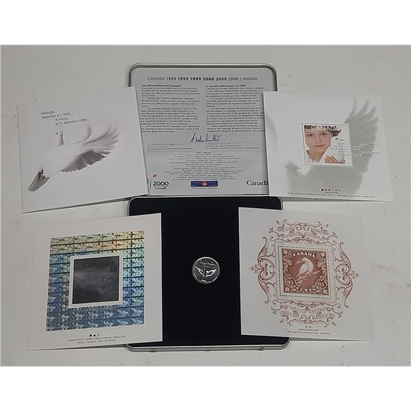 1999 – 2000 Official Millennium Keepsake. Includes 3 Stamps and a Dove Mint Medal. Housed i
