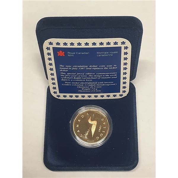 1987 Proof Loonie Dollar. The first year of the Loonie. Housed in its original RCM case.