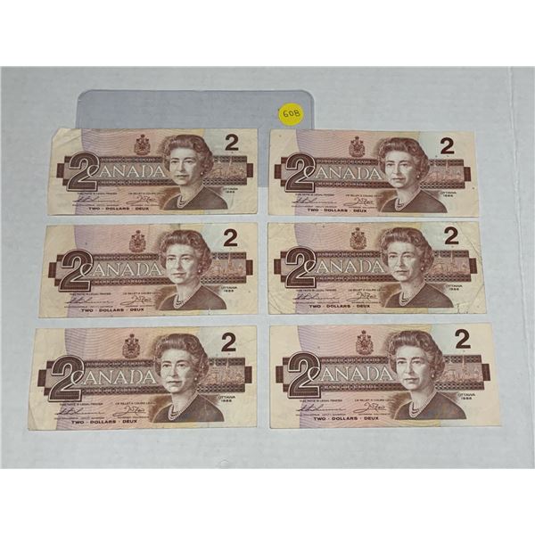 (6) 1986 Canada Two Dollars.