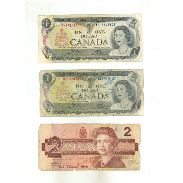 (2) 1973  Bank of Canada One Dollar and (1) 1986 Two Dollars.