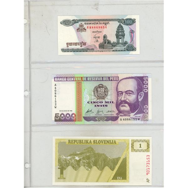 Binder of Foreign Currency Notes . (14 are New/Uncirculated) (Total 15 Notes)