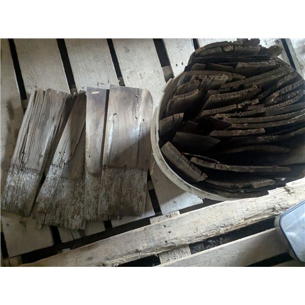 Bucket of used cedar shingles - mixed condition