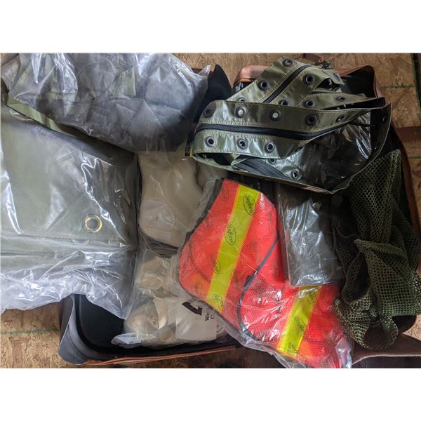suitcase of work gear and tarps