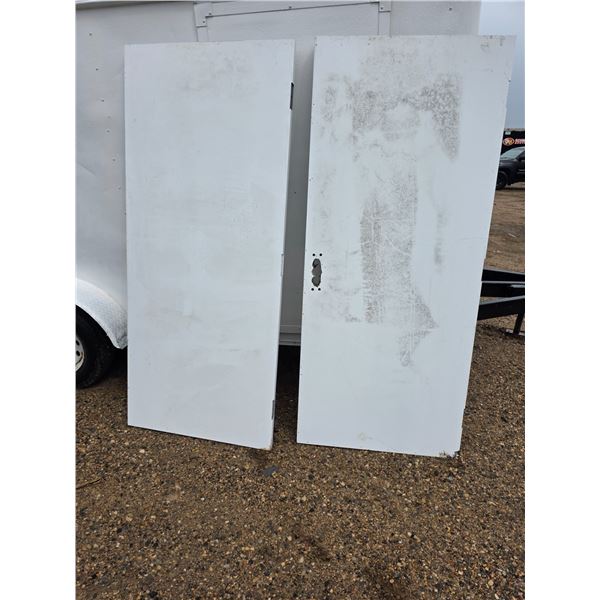 2 steel exterior doors- 36" by 83"H- with frame work pieces