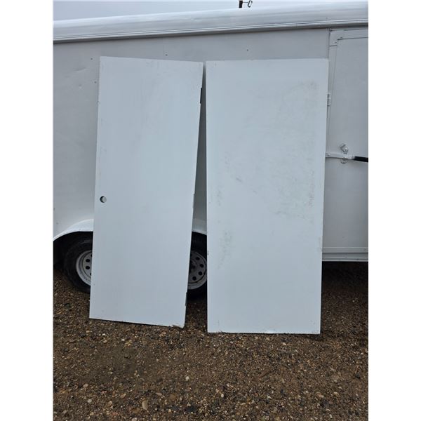 2 steel exterior doors- 36" by 83"H- with frame work pieces