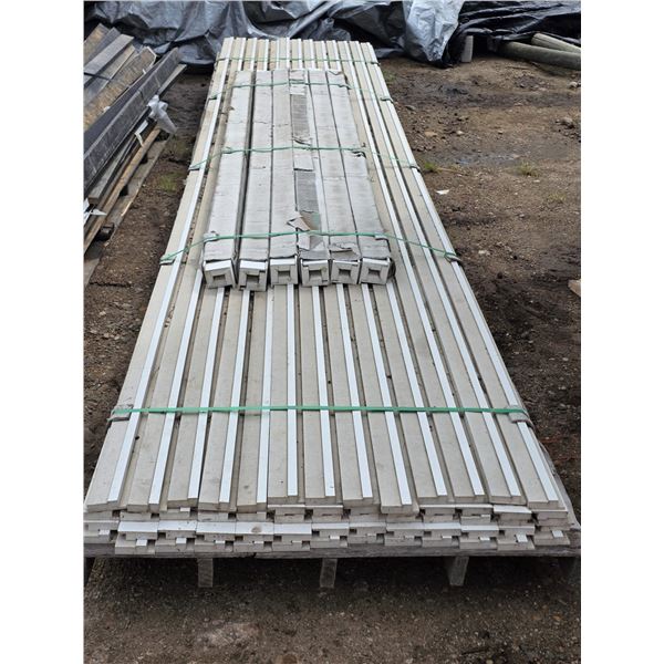 Pallet of particle board trim- 10Ft and 18Ft pieces