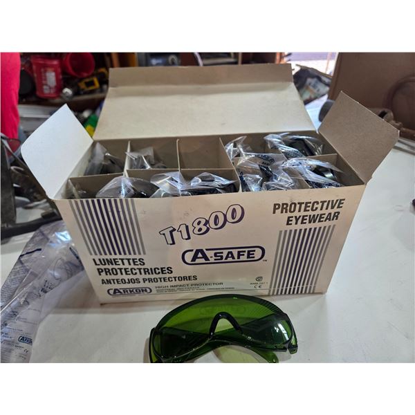 12 pair of protective eyeglasses