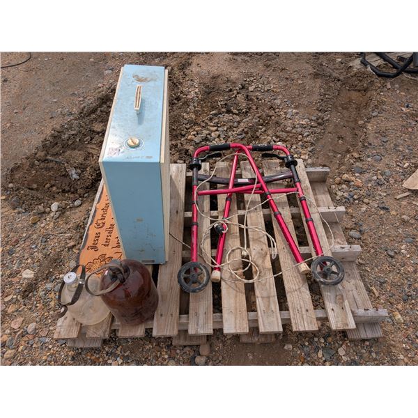 Pallet of Jugs, box Fan, collapsible walker, and etc.