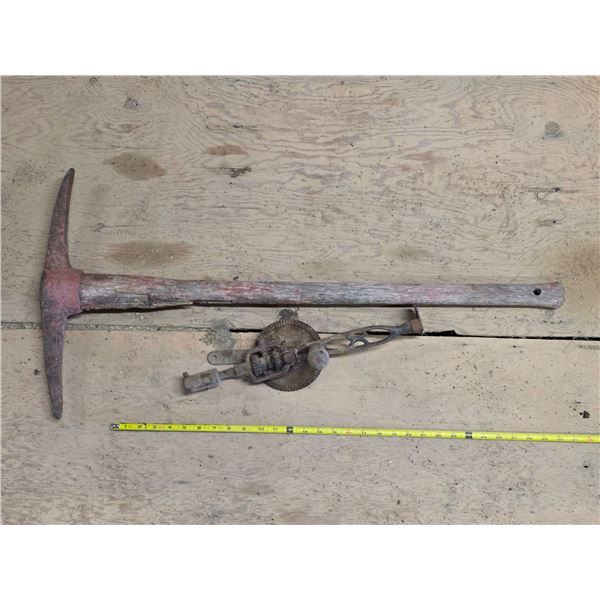 Antique pickaxe and hand drill