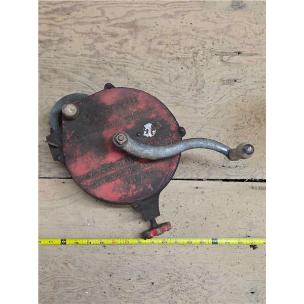 Antique keystone grinder