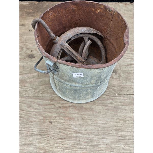 Antique pullies and bucket