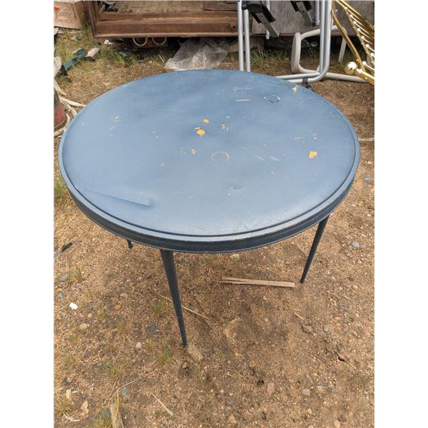 round folding card table, 4 legs, some damage to vinyl top