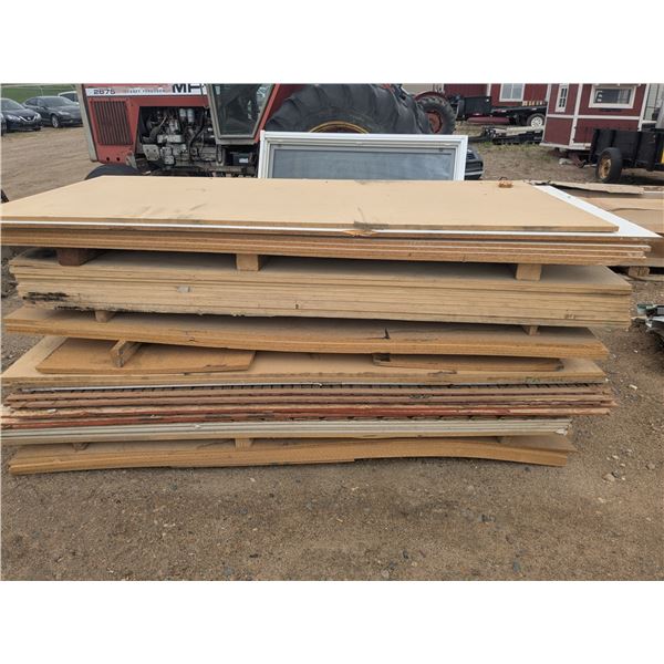 Pallet of mixed sheet lumber, approx  52-4'x8' sheets. (Particle board, melamine, birch plywood, lat