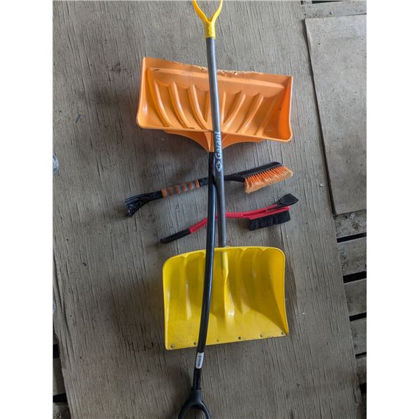 2 snow shovels with 2 window scrapers