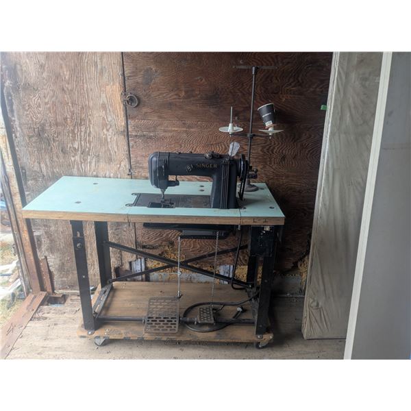 Vintage electric Singer sewing machine, with table