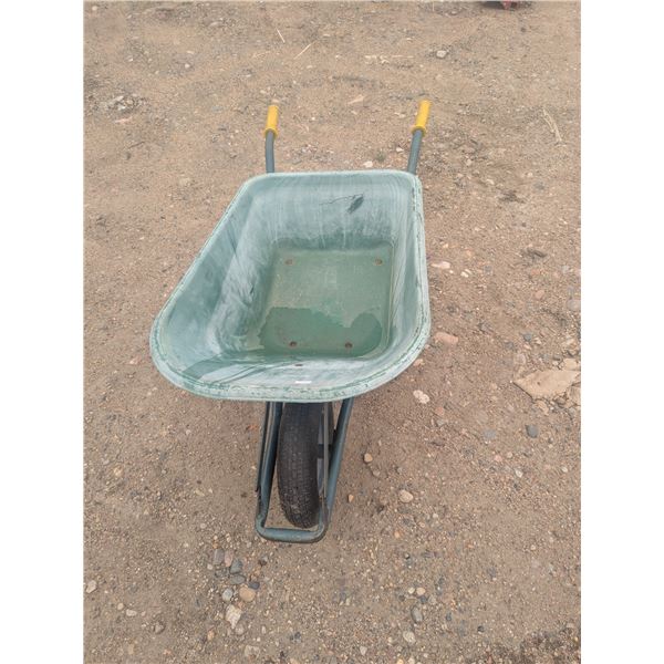 Large green wheelbarrow, plastic with metal handles and frame