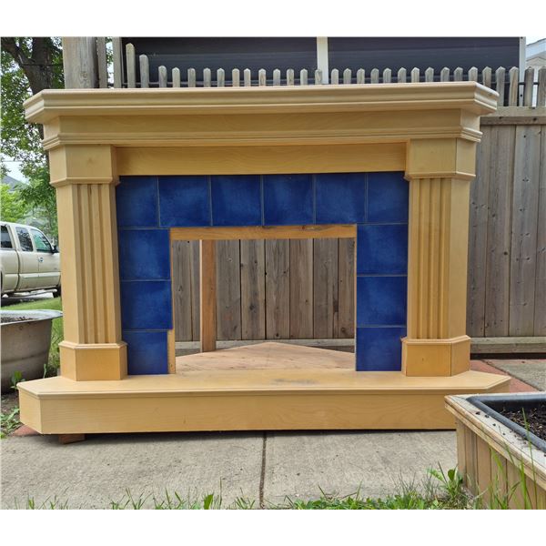 Large corner solid birch and birch 3/4 inch veneers fireplace surround & mantel. Never used, over $1