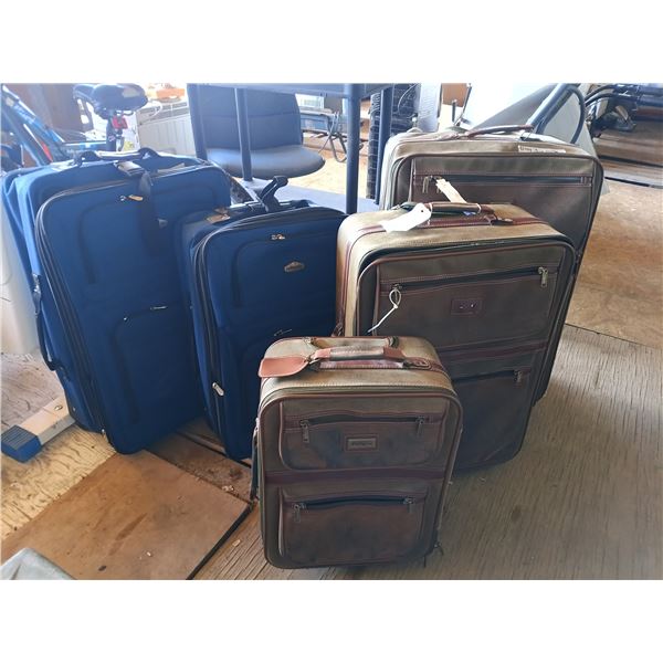 2 suit case sets - total of 5 bags