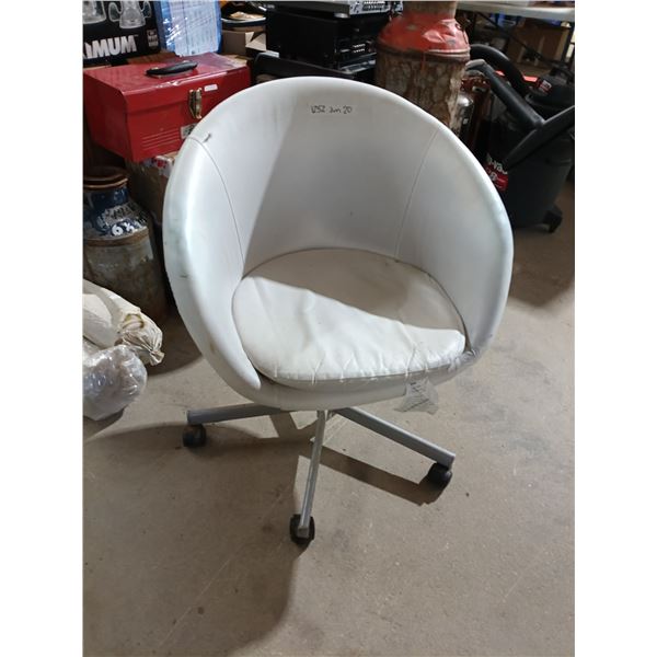 white rolling chair