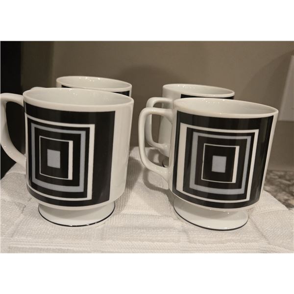 33 - Set of 4 Fred Roberts Op art black and white footed coffee mugs.  Retro MCM.  No chips or crack