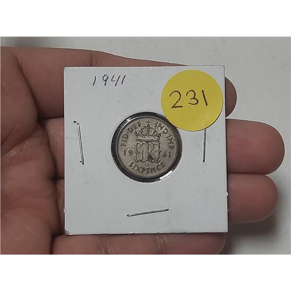 1941 British sixpence coin featuring the royal cypher of King George VI.