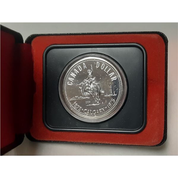 1975 Canadian Silver Dollar commemorating the 100th anniversary of the founding of Calgary.