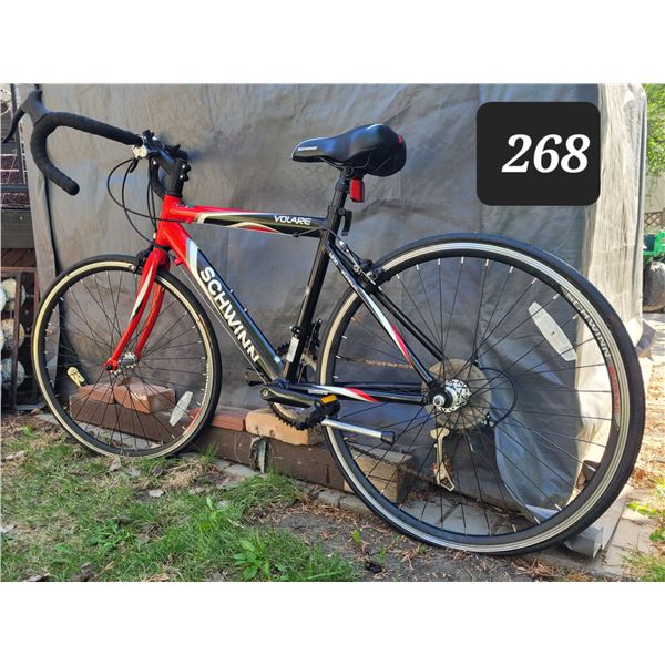Schwinn Volare 1300 bike. Aluminum frame, Shimano brakes.Tires need repair