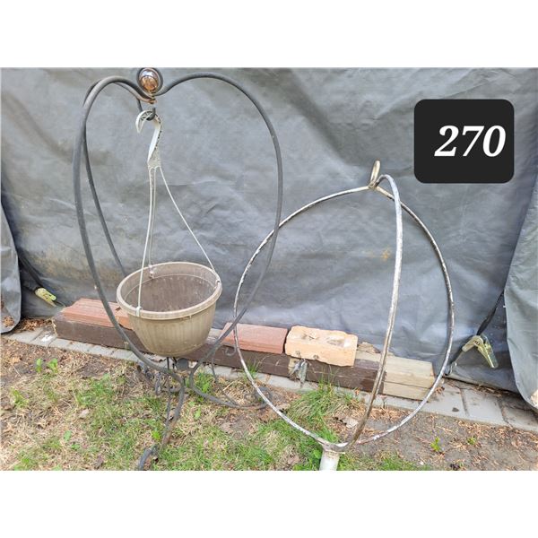 Metal outdoor hanging pot stands.