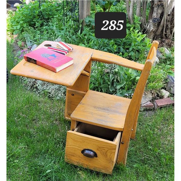Vintage small school desk. Has drawer & ink well. Vtg. Mystery book & chalk board brushes.