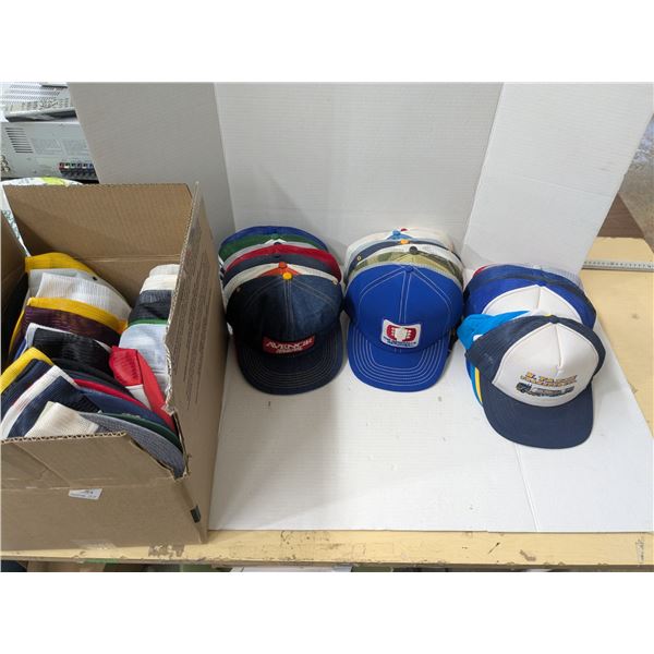 box of trucker hats, approximately 50, assorted company logos