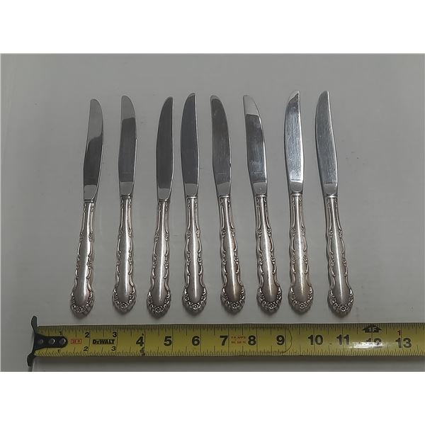 Silver Plated Knifes.