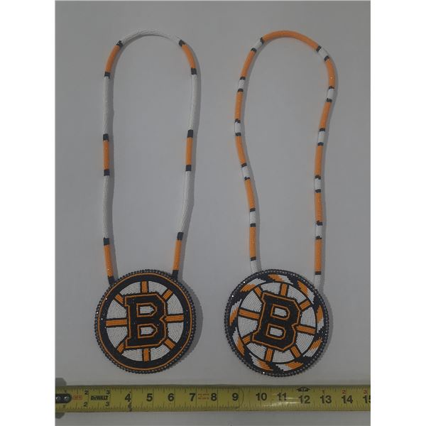 (2) Beaded medallion features the Boston Bruins logo crafted with yellow, black, and white seed bead