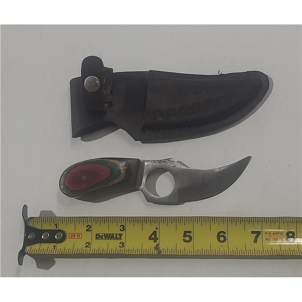 This is a 6-inch overall length, fixed-blade "Short Skinner" hunting knife. (Made In Pakistan).