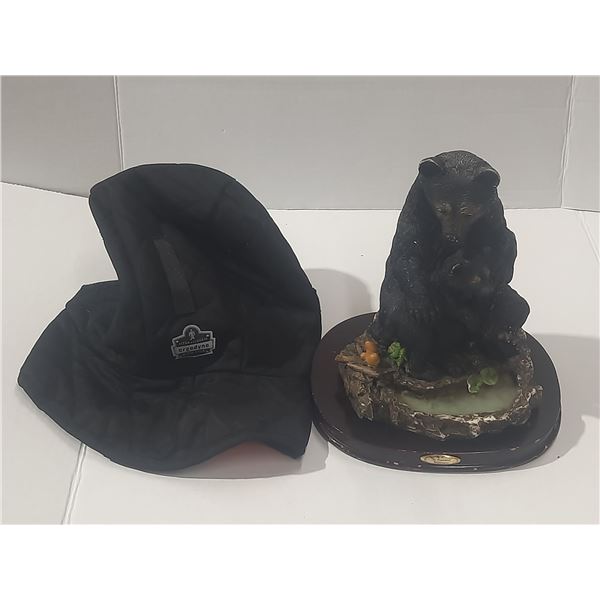 The Canadian Wilderness collection figurine features a black bear and cub, mounted on a dark wooden 