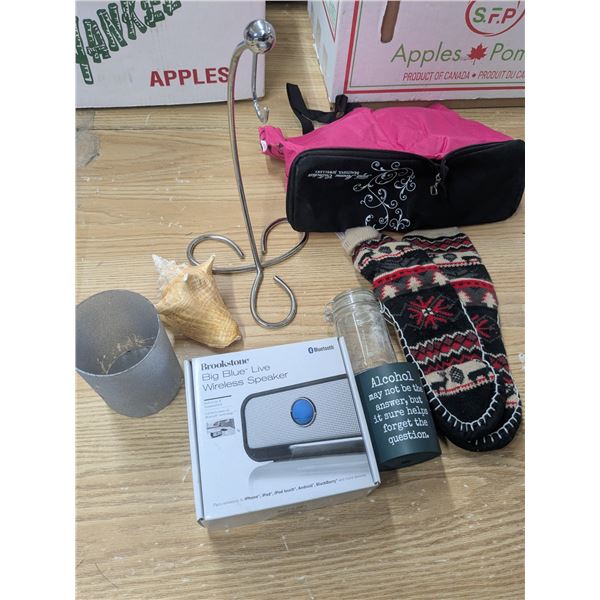 sliipers, shell, bluetooth speaker, and other stuff