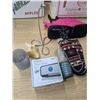 Image 1 : sliipers, shell, bluetooth speaker, and other stuff