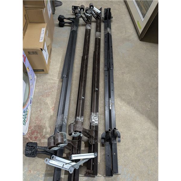 4 metal bedframes, one missing the castors