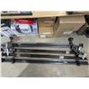 Image 2 : 4 metal bedframes, one missing the castors